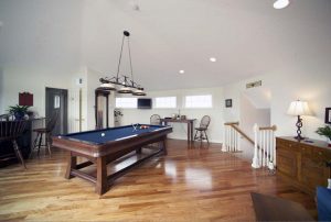 A room addition with a pool table
